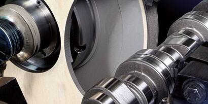 Outside diameter grinding of automotive camshaft
