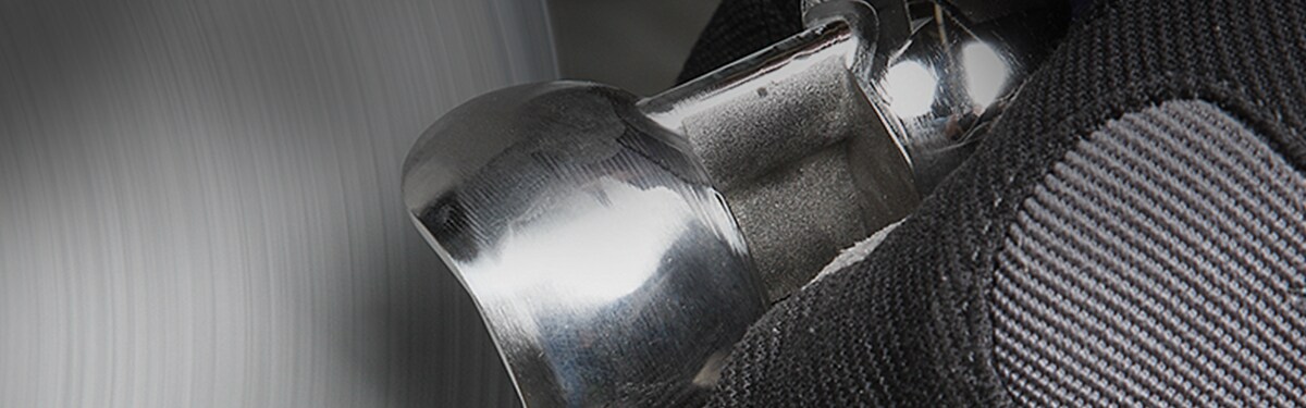 Polishing metal with a metal sanding belt
